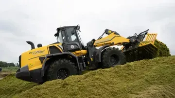 New Holland выпустил обновленный колесный погрузчик W170D с функцией Forage Power для силоса